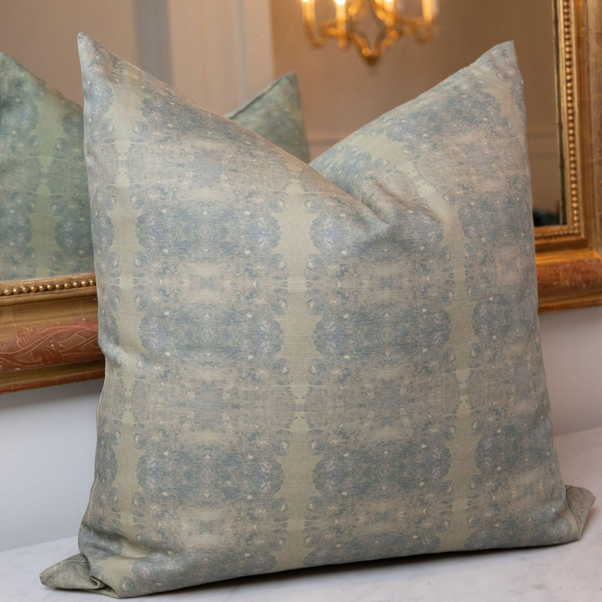 Centerpiece Rosemary luxury pillow featuring an abstract floral pattern in soft green tones, handcrafted in England for layered living rooms, bedrooms, and designer-curated interiors.