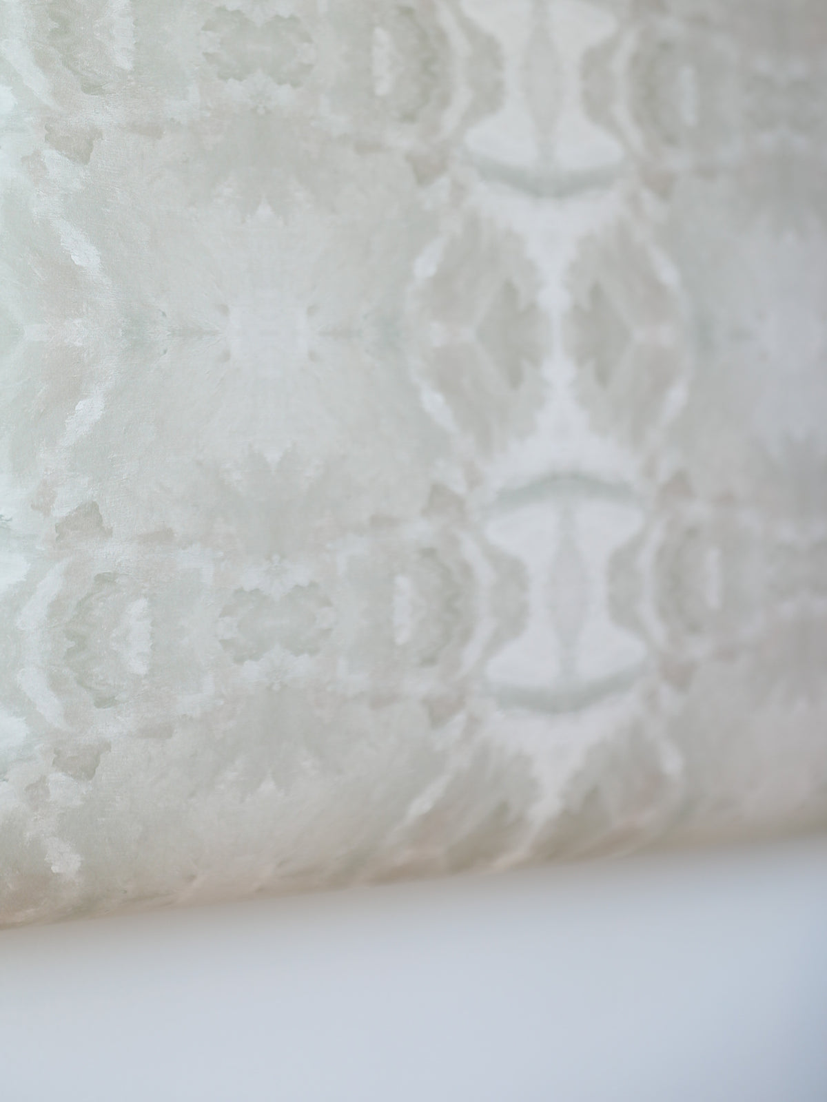 luxury abstract neutral wallpaper in soft putty tones with layered organic movement inspired by live oak trees, designed for modern traditional interiors, luxury bedrooms, powder rooms, dining spaces, and collected contemporary homes. Sustainably printed in England by Truett Designs.