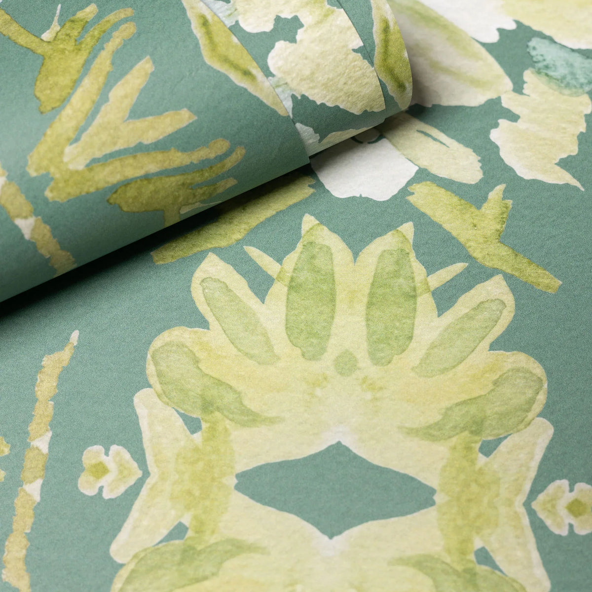 Luxury abstract floral wallpaper in rich dark green tones with layered organic movement, designed for modern traditional and collected interiors.