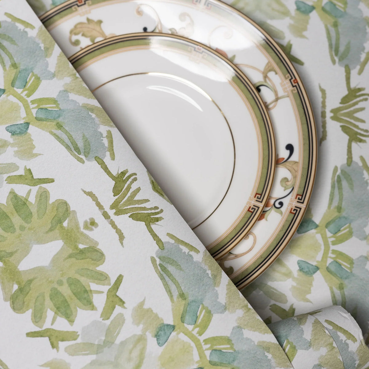 Wildflowers I White & Apple Green luxury wallpaper featuring an abstract floral pattern on a soft white ground with fresh apple green tones, sustainably printed in England for luxury homes, designer-curated interiors, powder rooms, bedrooms, and thoughtfully layered living spaces.