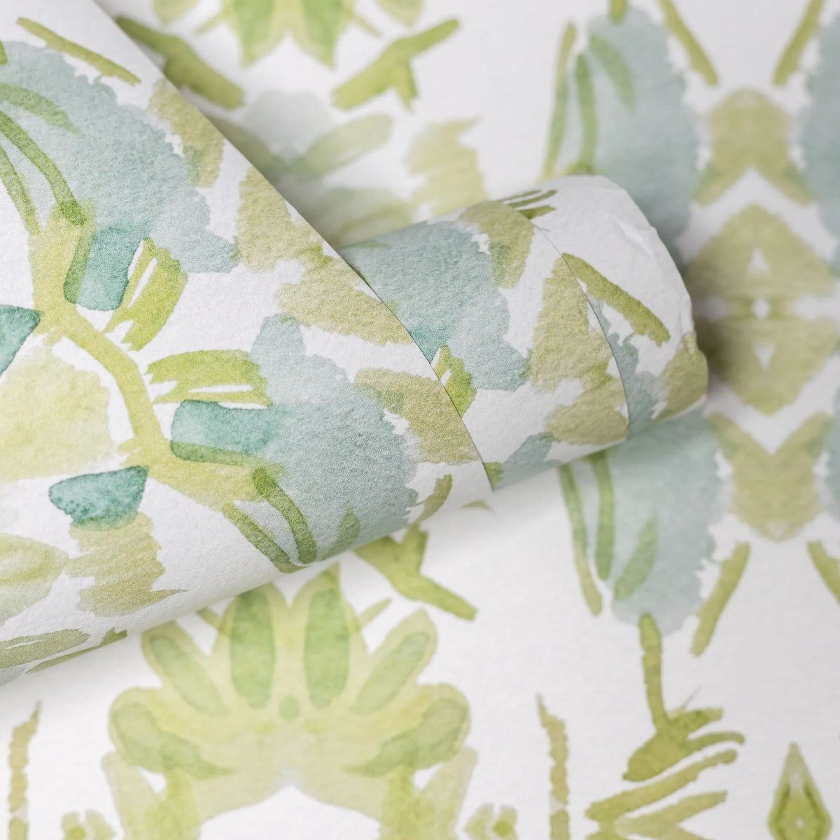 Wildflowers I White & Apple Green luxury wallpaper featuring an abstract floral pattern on a soft white ground with fresh apple green tones, sustainably printed in England for luxury homes, designer-curated interiors, powder rooms, bedrooms, and thoughtfully layered living spaces.