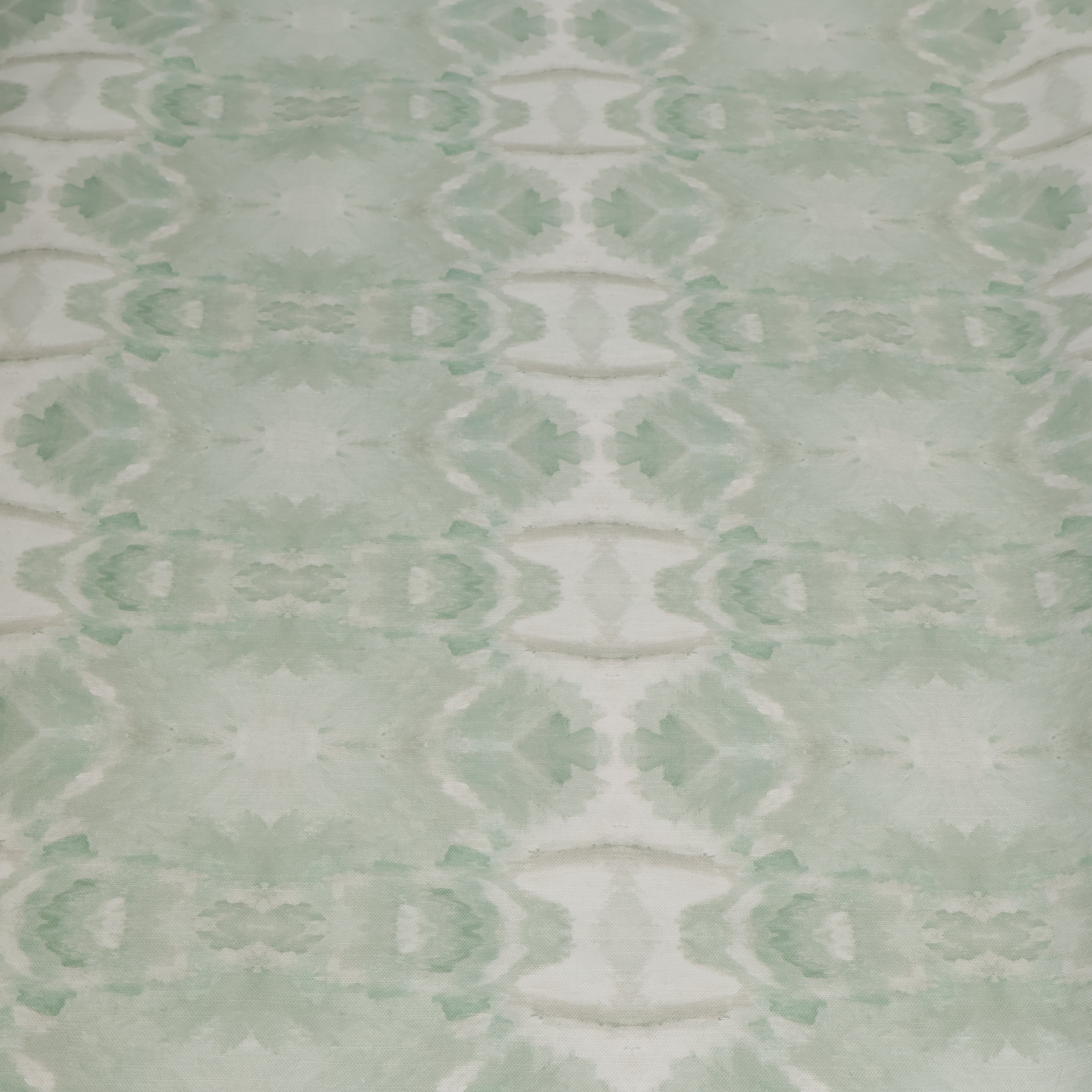 Luxury abstract botanical fabric featuring layered tree-inspired movement in calming jade green and soft neutral tones for collected modern traditional interiors.